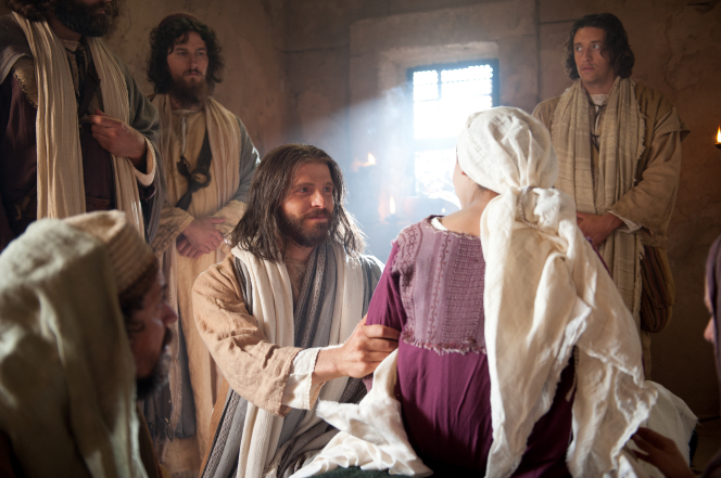 Christ raises the daughter of Jairus from death while her family looks on in gratitude.