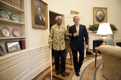 Nelson Mandela and George W. Bush at the Oval Office in 2005