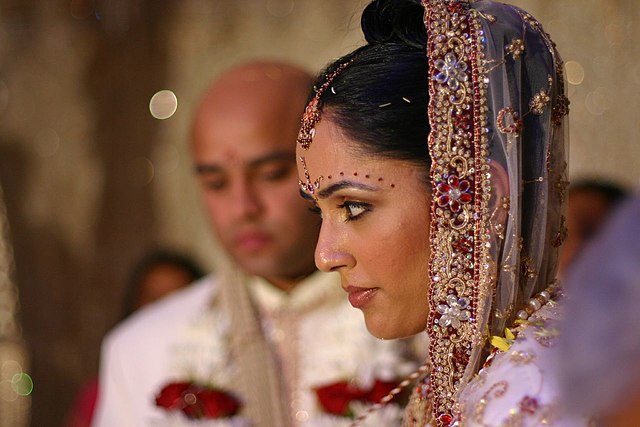 A bride during a traditional Hindu wedding ceremony in Punjab, India 
Credit: Tejal Patel - https://www.flickr.com/photos/tejspics/418806036
